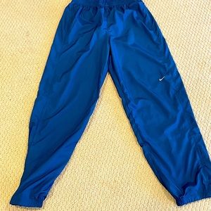 Vintage Nike “Mini-Swoosh” Track Pants🏃‍♂️ 
Blue
Size Medium